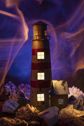 lighthouse surrounded by minerals