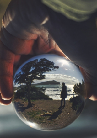 theme in a glass sphere